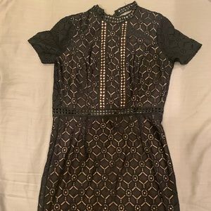 Nude with black lace dress